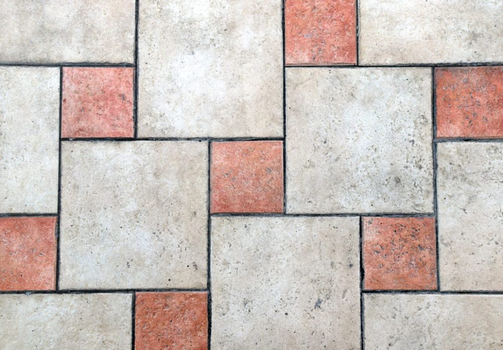 white and red stone tile walkway